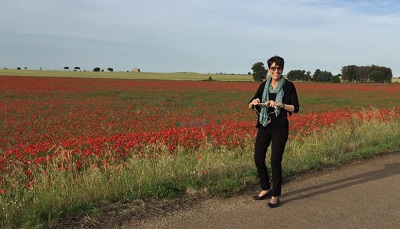 Gina in a poppy field